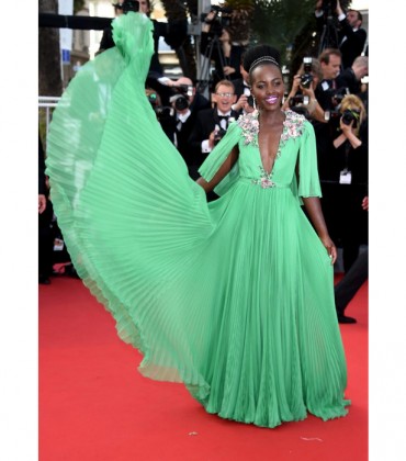 Snapshots.  Lupita Nyong’o Stuns in a Green Gucci Gown At Cannes.